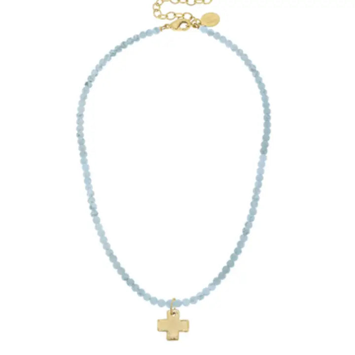Gold Cross on Light Blue Beaded Necklace