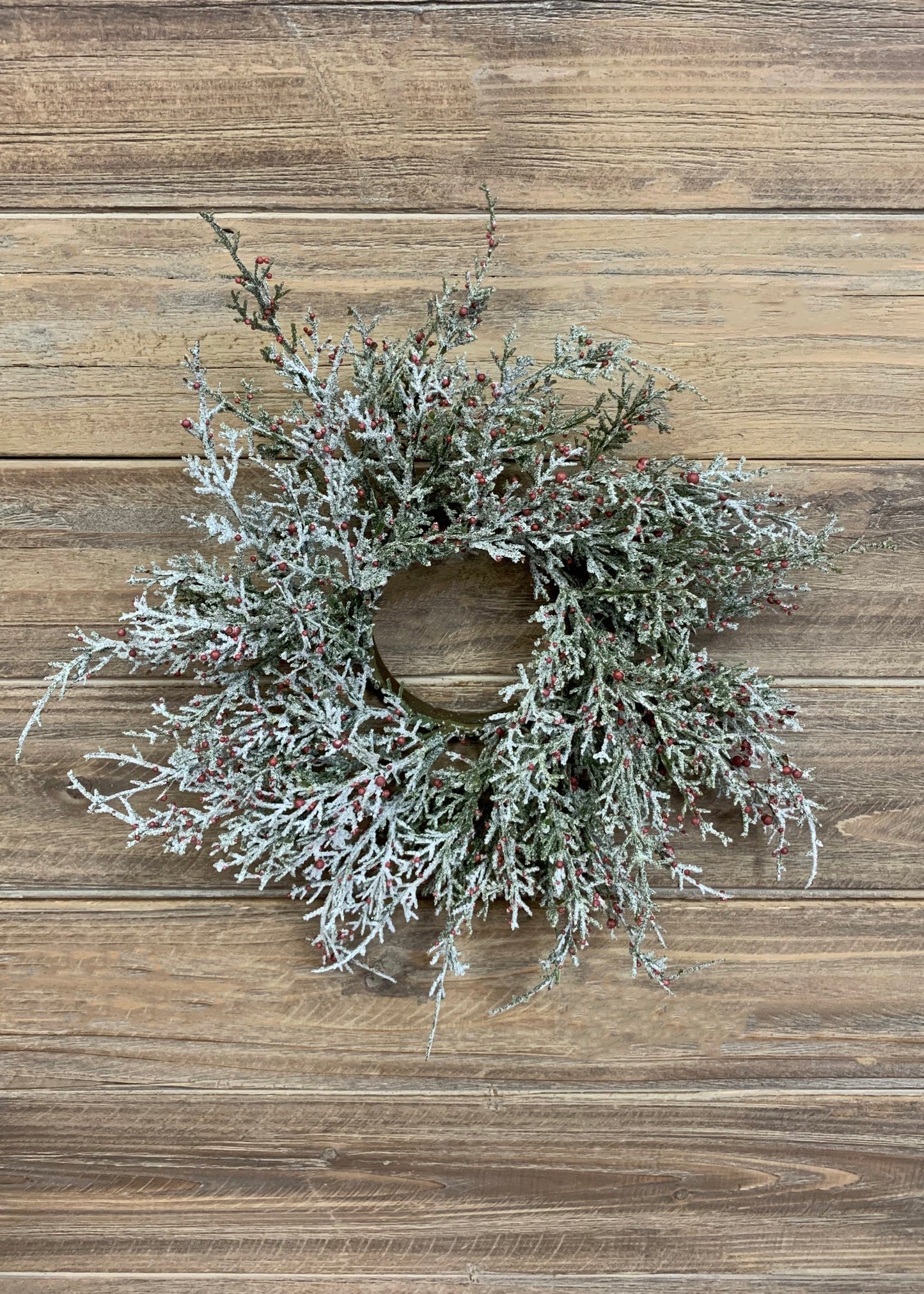 Glittered cedar and red berries candle ring