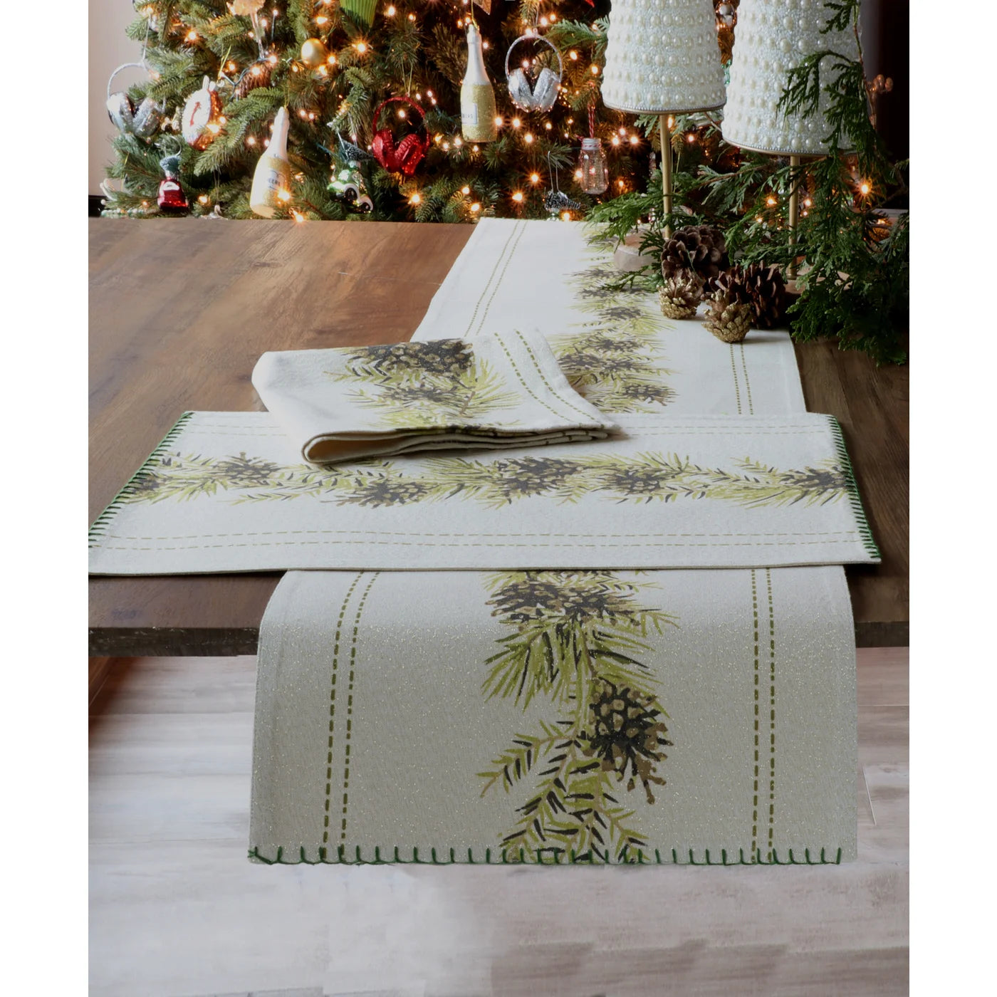 Shimmer Pinecone Table Runner in Green.